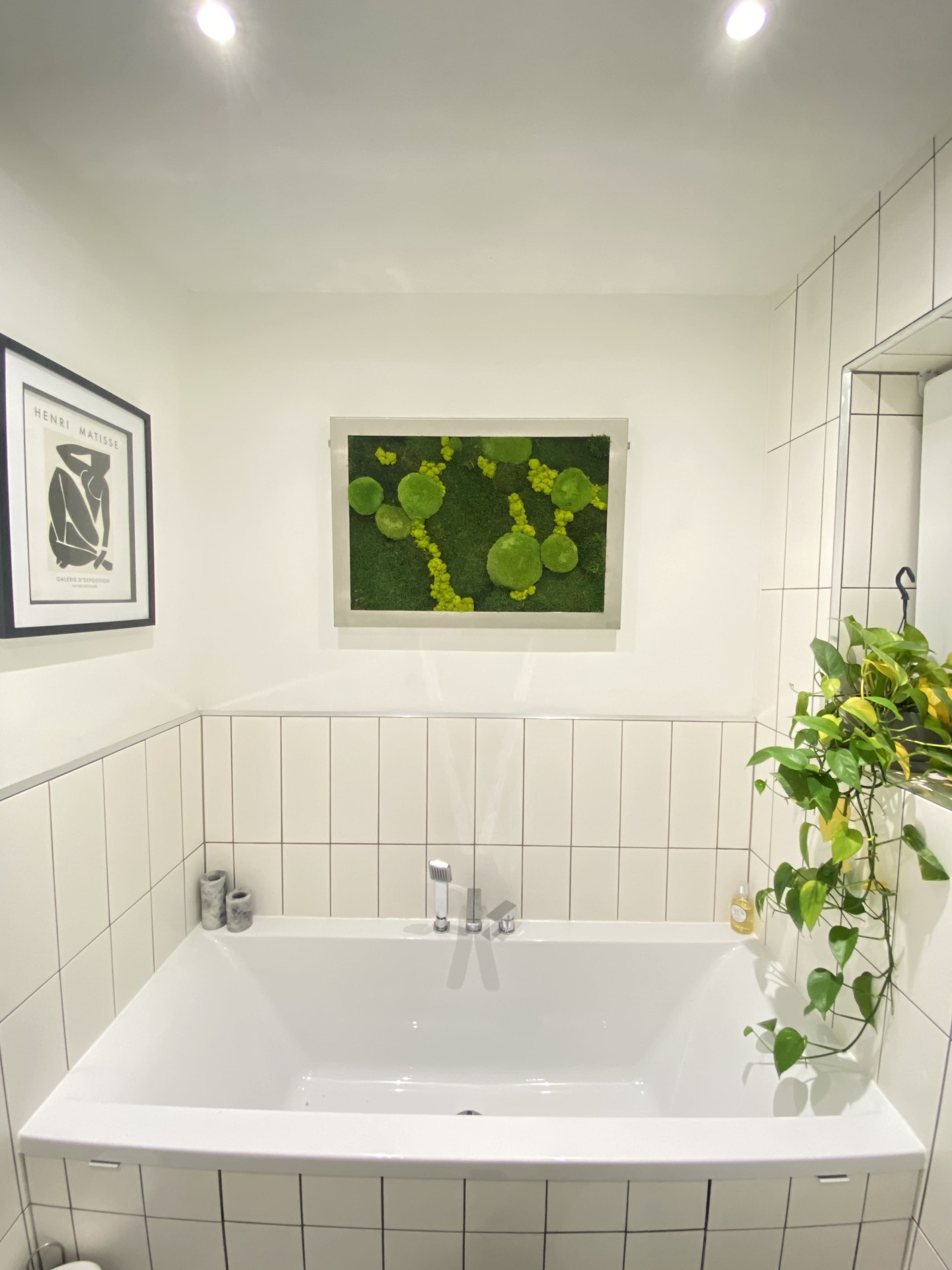 Completed vanity basin detail with fitted storage and tiled walls