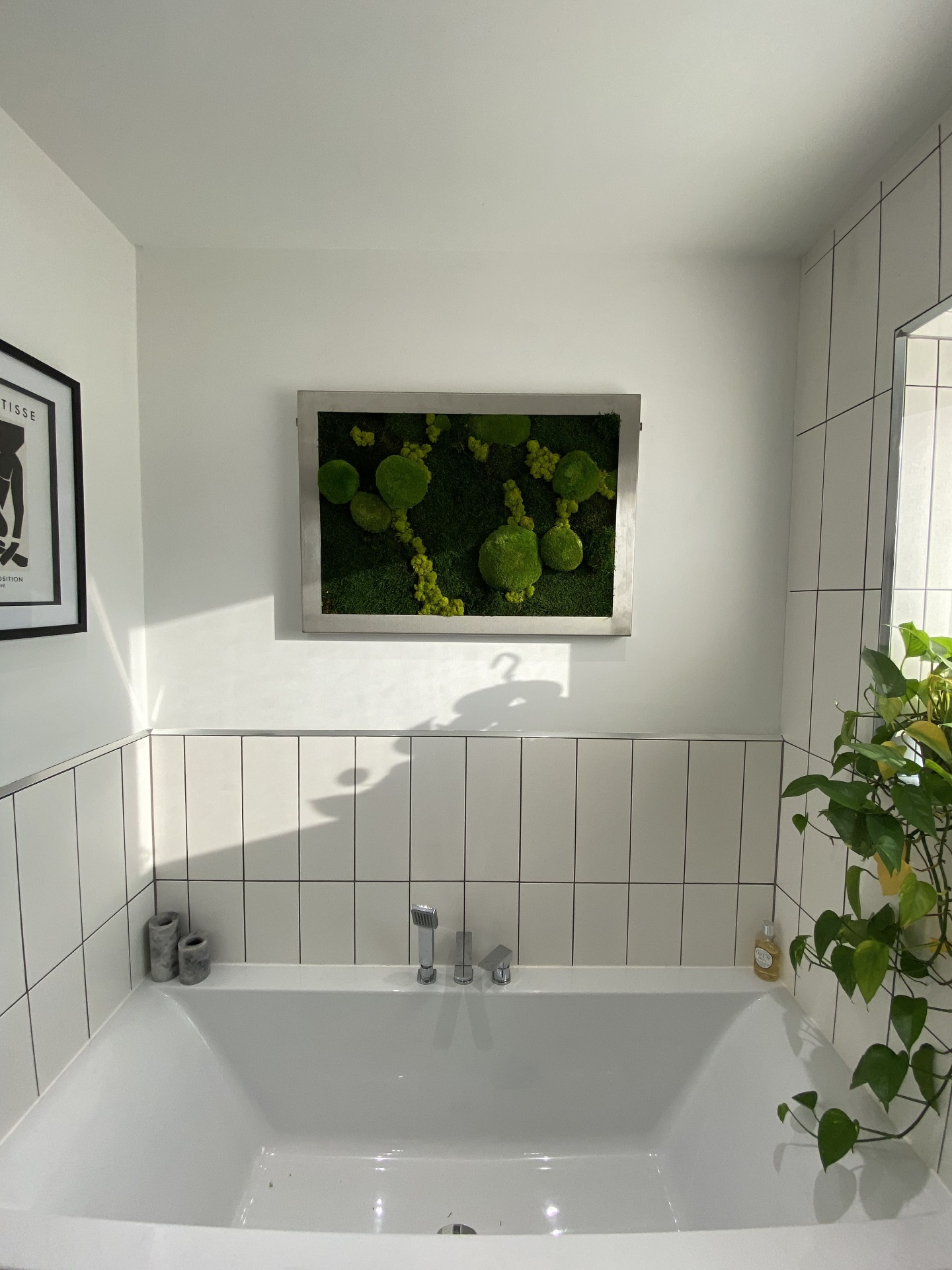 Completed wet room shower area with glazed screen and tiled floor