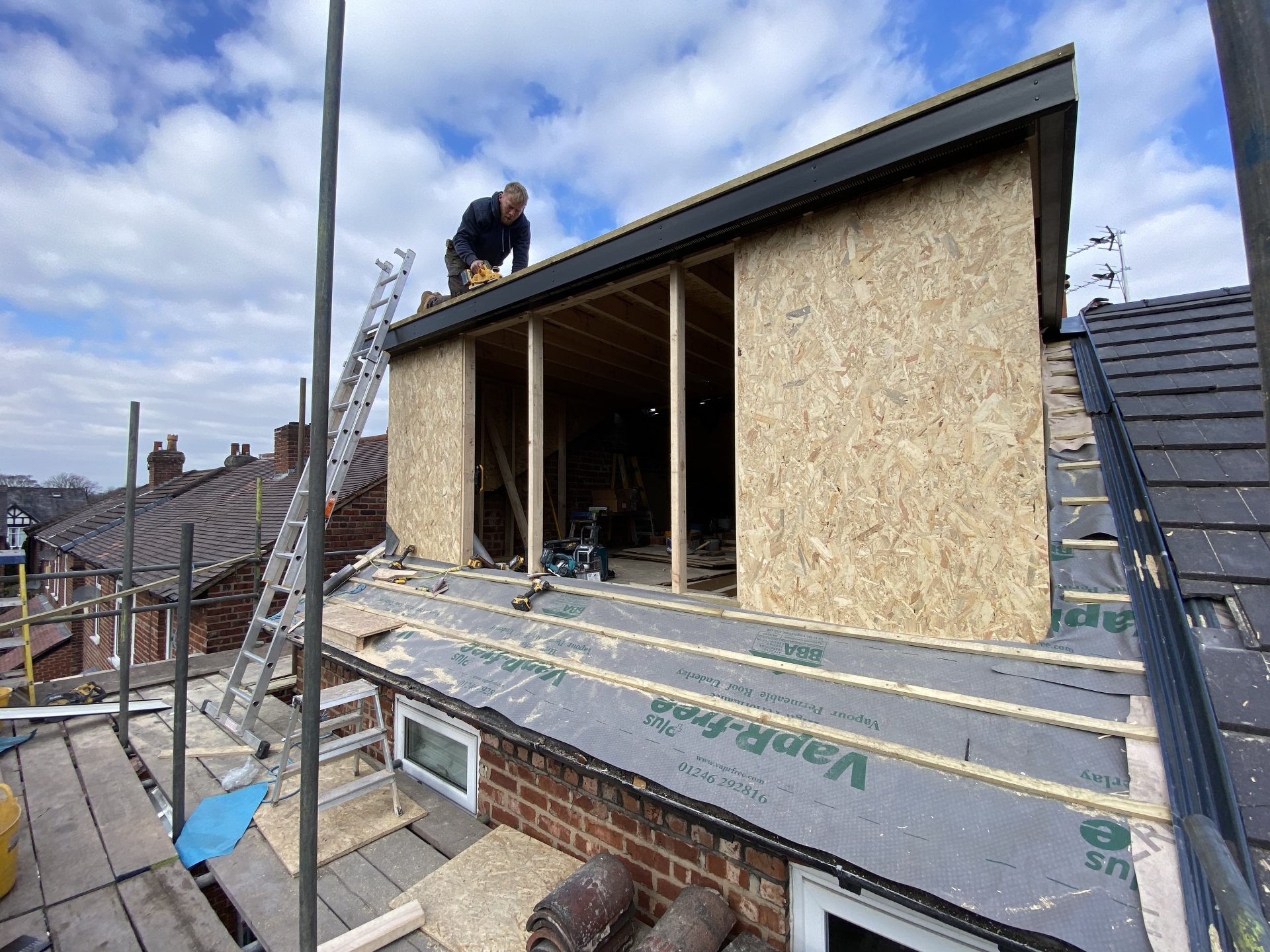 Completed dormer shell finished externally with roof edge details