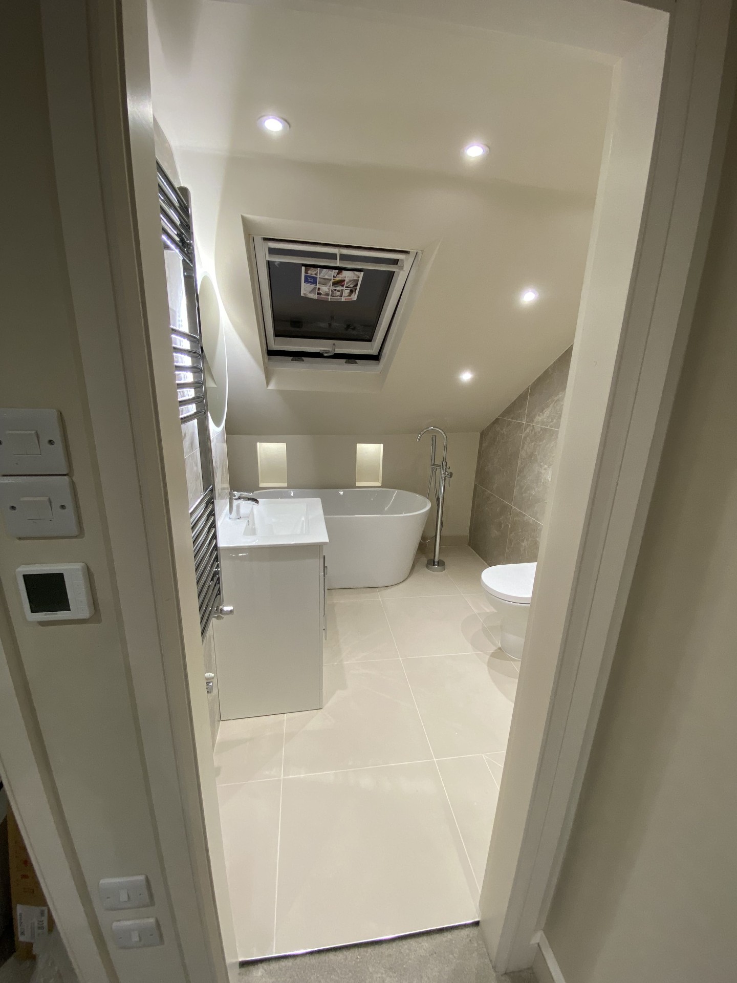 Completed bathroom or landing view with polished renovation finishes