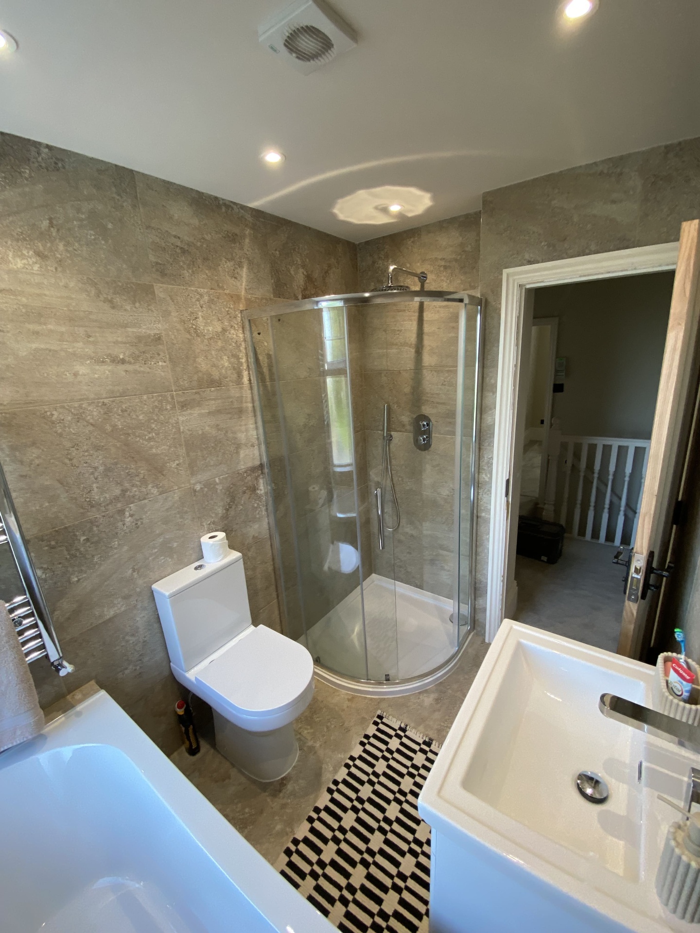 Completed bathroom or shower room detail with polished finish